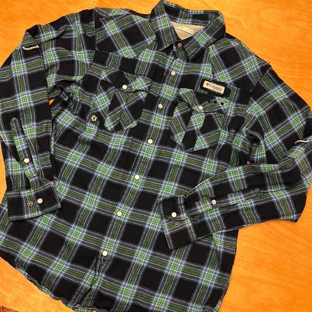 Woman’s Columbia PFG navy and green plaid flannel shirt